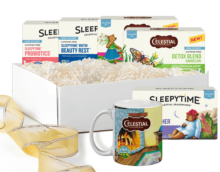 Celestial Seasonings tea boxes and mug called Mindful Moments Tea & Mug Gift Set with gold ribbon and white box